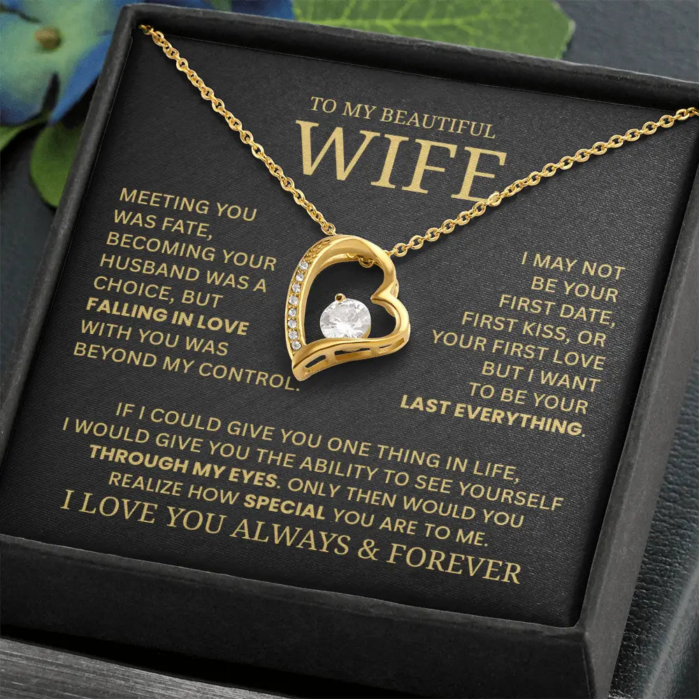 Heart-shaped gold necklace with a diamond on a black card for a wife, featuring romantic text.