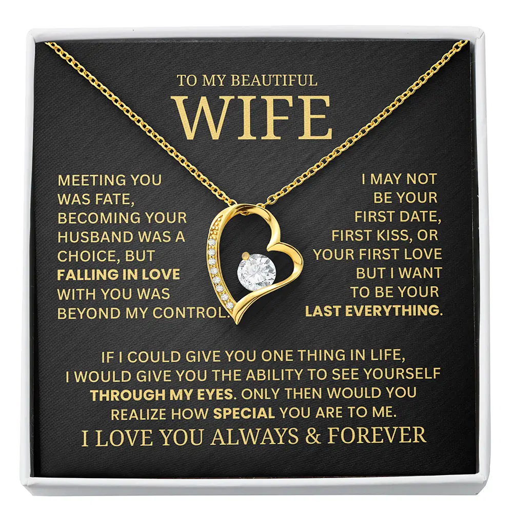 Gold necklace with heart design on a black card with gold text for a wife